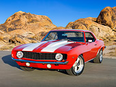 CAM 03 RK0246 01
1969 Chevrolet Camaro Red With White Stripes 3/4 Front View On Pavement By Boulders