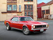 CAM 03 RK0256 01
1967 Chevrolet Camaro RS Red 3/4 Front View On Pavement By Old Buildings