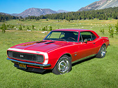 CAM 03 RK0262 01
1967 Chevrolet Camaro Red 3/4 Front View On Grass By Evergreen Trees And Mountain