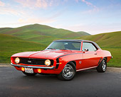 CAM 03 RK0265 01
1969 Chevrolet Camaro SS Orange With Black Top 3/4 Front View On Pavement By Grassy Hills