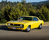 CAM 03 RK0003 02
1969 Chevy Camaro Street Rod Yellow 3/4 Front View On Road