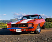 CAM 03 RK0042 01
1969 Chevrolet Camaro RS-Z28 Hugger Orange White Stripe Low 3/4 Front View On Pavement
