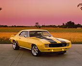 CAM 03 RK0060 03
1969 Chevy Camaro ZL1 Yellow And Black 3/4 Front View On Pavement