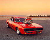 CAM 03 RK0098 03
1968 Chevy Camaro Prostreet Orange Purple Graphics 3/4 Front View On Pavement Filtered