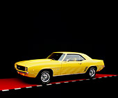 CAM 03 RK0112 08
1969 Chevrolet Camaro RS C.O.P.O Yellow 3/4 Side View On Red Floor Checkered Line Studio