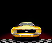 CAM 03 RK0115 04
1969 Chevrolet Camaro RS C.O.P.O Yellow Wide Angle Head On Shot On Checkered And Red Floor Studio