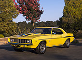 CAM 03 RK0126 01
1969 Chevrolet Yenko Camaro Daytona Yellow And Black Side 3/4 View On Pavement By Trees