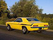 CAM 03 RK0128 01
1969 Chevrolet Yenko Camaro Daytona Yellow And Black Rear 3/4 View On Pavement By Trees