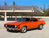 CAM 03 RK0149 01
1969 Chevrolet Camaro Hugger Orange 3/4 Front View On Pavement