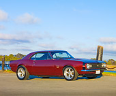 CAM 03 RK0199 01
1967 Chevrolet Camaro Burgundy 3/4 Front View On Pavement At Marina