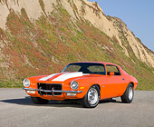 CAM 04 RK0134 01
1973 Chevrolet Camaro Orange And White Stripes 3/4 Front View On Pavement By Sand Dune