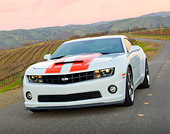 CAM 04 RK0184 01
2011 Chevrolet SLP Camaro ZL 585 White With Red Stripes 3/4 Front View On Road By Vineyard