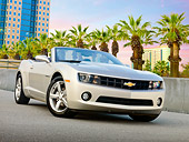 CAM 04 RK0193 01
2011 Chevrolet Camaro Convertible Silver 3/4 Front View On Pavement By City Buildings And Palm Trees