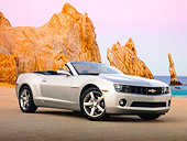 CAM 04 RK0194 01
2011 Chevrolet Camaro Convertible Silver 3/4 Front View On Pavement By Red Rock And Water