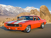 CAM 04 RK0241 01
1969 Chevrolet Camaro Orange With White Stripes 3/4 Front View On Pavement By Mountains