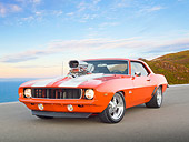CAM 04 RK0244 01
1969 Chevrolet Camaro Orange With White Stripes 3/4 Front View On Pavement By Ocean