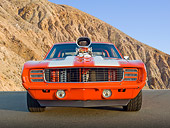 CAM 04 RK0249 01
1969 Chevrolet Camaro Orange With White Stripes Front View On Pavement By Cliffside