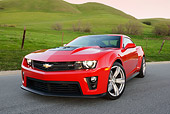 CAM 04 RK0259 01
2013 Chevrolet Camaro ZL1 Red 3/4 Front View On Pavement By Grassy Hills