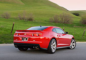 CAM 04 RK0261 01
2013 Chevrolet Camaro ZL1 Red 3/4 Rear View On Pavement By Grassy Hills