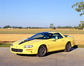 CAM 04 RK0060 06
2002 Chevrolet Camaro ZL1 Yellow And Black 3/4 Front View On Pavement By Field