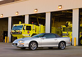 CAM 04 RK0099 01
2002 Chevrolet Camaro SS SLP Silver 3/4 Front View By Fire Truck
