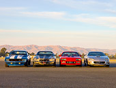 CAM 04 RK0108 01
1969, 1973, 1986 & 2002 Chevrolet Camaros Head On View By Mountain