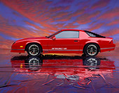CAM 06 RK0001 08
1987 Chevrolet Camaro Convertible Iroc-Z Red Profile On Mylar Floor Sunset Background