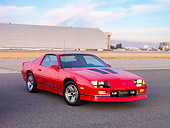 CAM 06 RK0028 01
1986 Chevrolet Camaro IROC-Z Red 3/4 Front View By Hangar