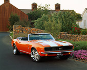 CAM 07 RK0015 01
1968 Chevrolet Camaro RS/SS Convertible Orange White Stripe 3/4 Front View By Flowers And Bushes