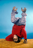 CHI 03 RC0007 01
Chimpanzee Standing On Head Wearing Pants And Shirt Studio