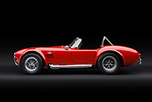 COB 01 RK0143 01
1966 Shelby AC Cobra Red With White Stripes Profile View In Studio