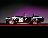 COB 01 RK0013 02
1966 Shelby Cobra Race Car Black Profile View On Red Line Purple Lighting Studio
