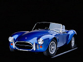 COB 01 RK0078 02
1967 AC Cobra 427 CSX 3342 Convertible Blue 3/4 Front View On Gray Line Studio