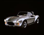 COB 01 RK0082 06
1967 Shelby Cobra Tunnel Port Convertible Silver 3/4 Front View Studio