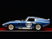 COB 01 RK0103 01
1964 Cobra Daytona Coupe Blue White Stripe Profile View Studio