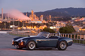 COB 01 RK0120 01
1966 Shelby Cobra 427 SC Replica Blue And White 3/4 Side View On Pavement