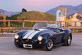 COB 01 RK0122 01
1966 Shelby Cobra 427 SC Replica Blue And White 3/4 Front View On Pavement