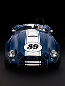 COB 01 RK0128 01
1964 Shelby Cobra 289 AC Blue Convertible Head On View Studio