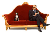 DOG 02 JE0051 01
Boston Terrier Sitting On Red Sofa With Psychiatrist On White Seamless