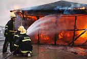 FIR 01 RK0005 01
Three Firemen Fighting Fire In Garage