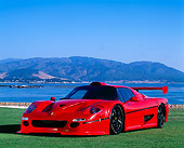 FRR 01 RK0062 04
Ferrari F-50 GTR 1 Red 3/4 Front View On Grass By Water Blue Sky