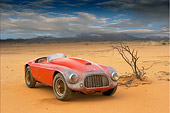 FRR 03 RK0033 01
1950 Ferrari 166MM Barchetta Red 3/4 Front View In Desert