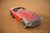 FRR 03 RK0037 01
1950 Ferrari 166mm Barchetta Red 3/4 Front View On Dirt