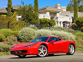 FRR 04 RK0656 01
2011 Ferrari 458 Italia Red 3/4 Front View On Pavement By House And Shrubs