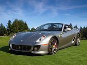 FRR 04 RK0699 01
2012 Ferrari 599 SA Aperta Gray 3/4 Front View On Grass By Trees