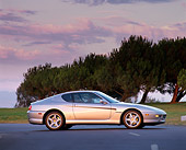 FRR 04 RK0006 03
1994 Ferrari 456 GT Silver 3/4 Front View On Pavement Trees Background