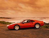 FRR 04 RK0047 04
1985 Ferrari 328 GT Red  3/4 Front View On Sand By Beach