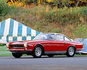 FRR 04 RK0084 06
1960 Ferrari 250 GT SWB 3/4 Side View By White And Blue Tent And Trees