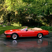 FRR 04 RK0140 07
1982 Ferrari 400I Convertible Red Profile On Wet Pavement By Trees