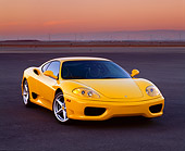 FRR 04 RK0184 03
1999 Ferrari 360 Modena Yellow 3/4 Front View On Pavement At Dusk